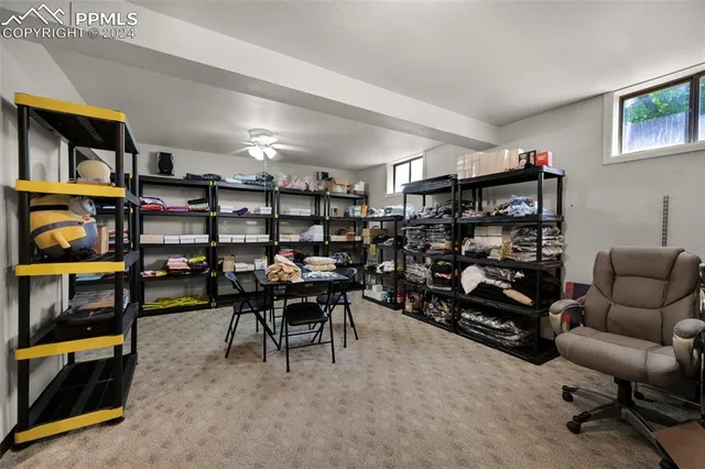 a view of a workspace with furniture