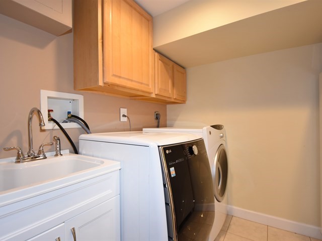 7715 East Prairie Road Skokie, IL 60076 - Photo 25 of 26 a utility room with dryer and washer
