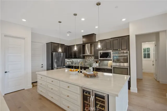 a view of a livingroom with furniture and stairs