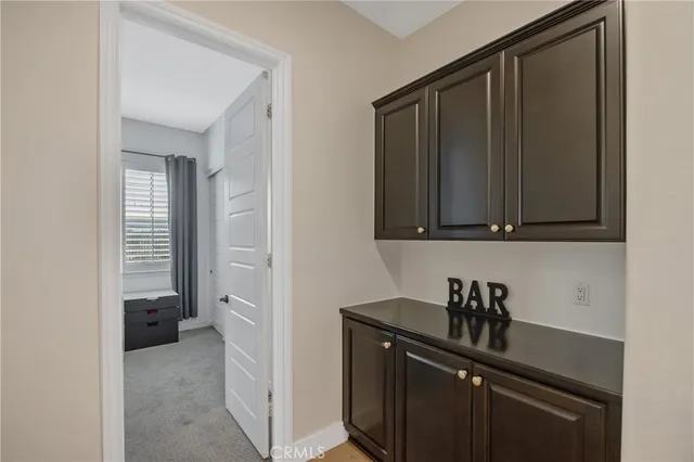 a bathroom with a double vanity sink and mirror
