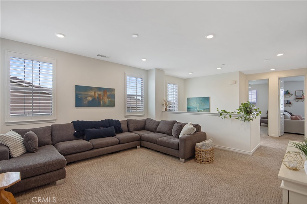 26464 Township Street Saugus, CA 91350 - Photo 27 of 74 a living room with furniture and a large window