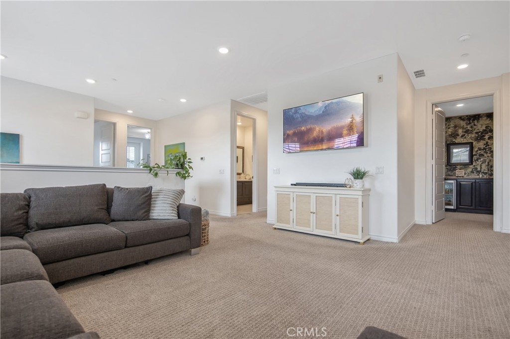 26464 Township Street Saugus, CA 91350 - Photo 28 of 74 a living room with furniture and a white couch