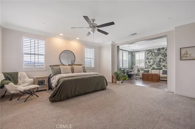 a view of a swimming pool with outdoor seating space