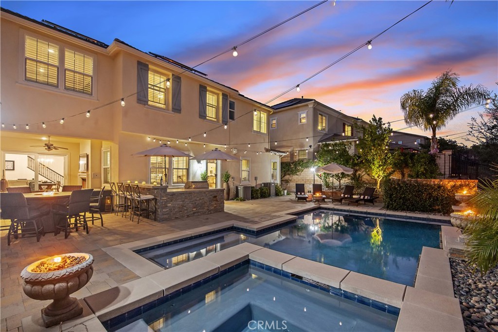 26464 Township Street Saugus, CA 91350 - Photo 3 of 74 a view of a swimming pool with outdoor seating