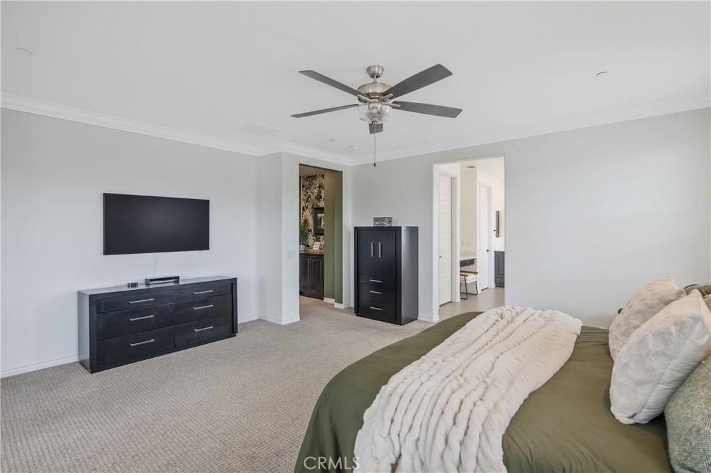 26464 Township Street Saugus, CA 91350 - Photo 33 of 74 a bedroom with a bed and a flat screen tv