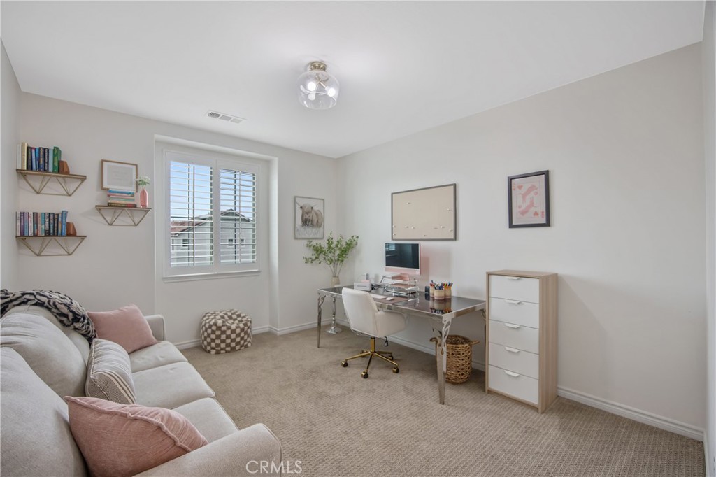 26464 Township Street Saugus, CA 91350 - Photo 39 of 74 a living room with furniture and a window