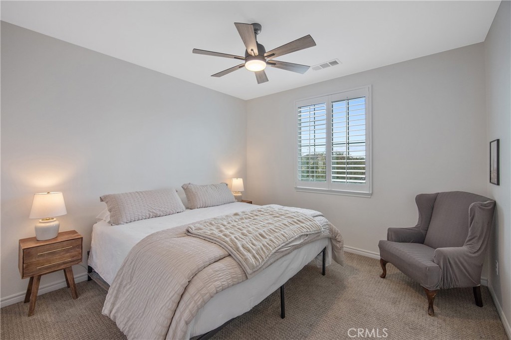 26464 Township Street Saugus, CA 91350 - Photo 40 of 74 a bedroom with a bed and a couch