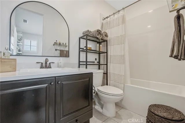 an aerial view of a house with a swimming pool