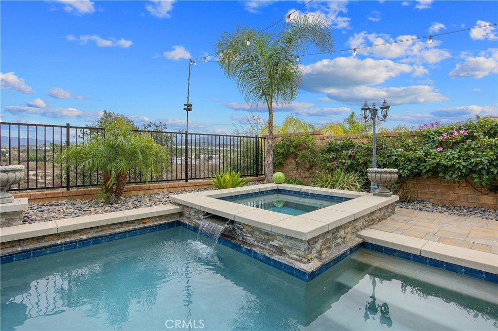 26464 Township Street Saugus, CA 91350 - Photo 50 of 74 a view of a swimming pool with a patio