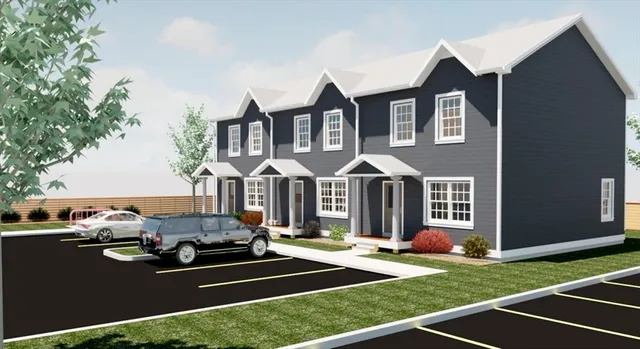 a front view of a house with yard and patio