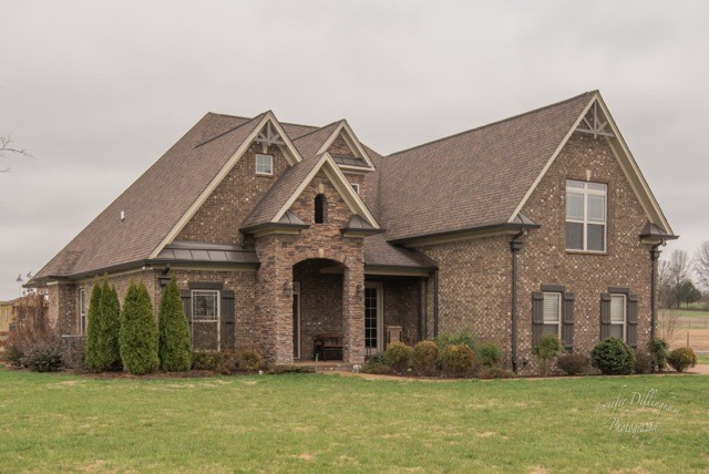 2488 Double Log Cabin Road Lebanon, TN 37087 - Photo 1 of 50 a front view of a house with a yard