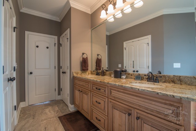 2488 Double Log Cabin Road Lebanon, TN 37087 - Photo 23 of 50 a bathroom with a double vanity sink and a mirror