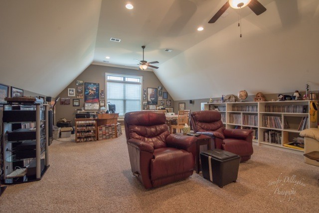 2488 Double Log Cabin Road Lebanon, TN 37087 - Photo 27 of 50 a living room with furniture and a book shelf