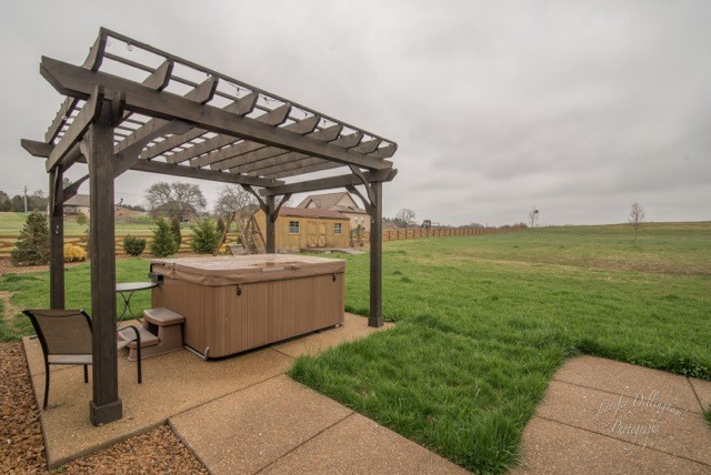 2488 Double Log Cabin Road Lebanon, TN 37087 - Photo 39 of 50 a view of a patio with a table and chairs