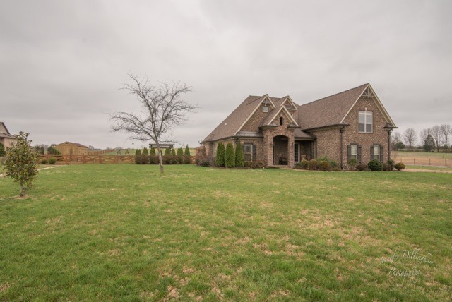 2488 Double Log Cabin Road Lebanon, TN 37087 - Photo 5 of 50 a front view of a house with garden