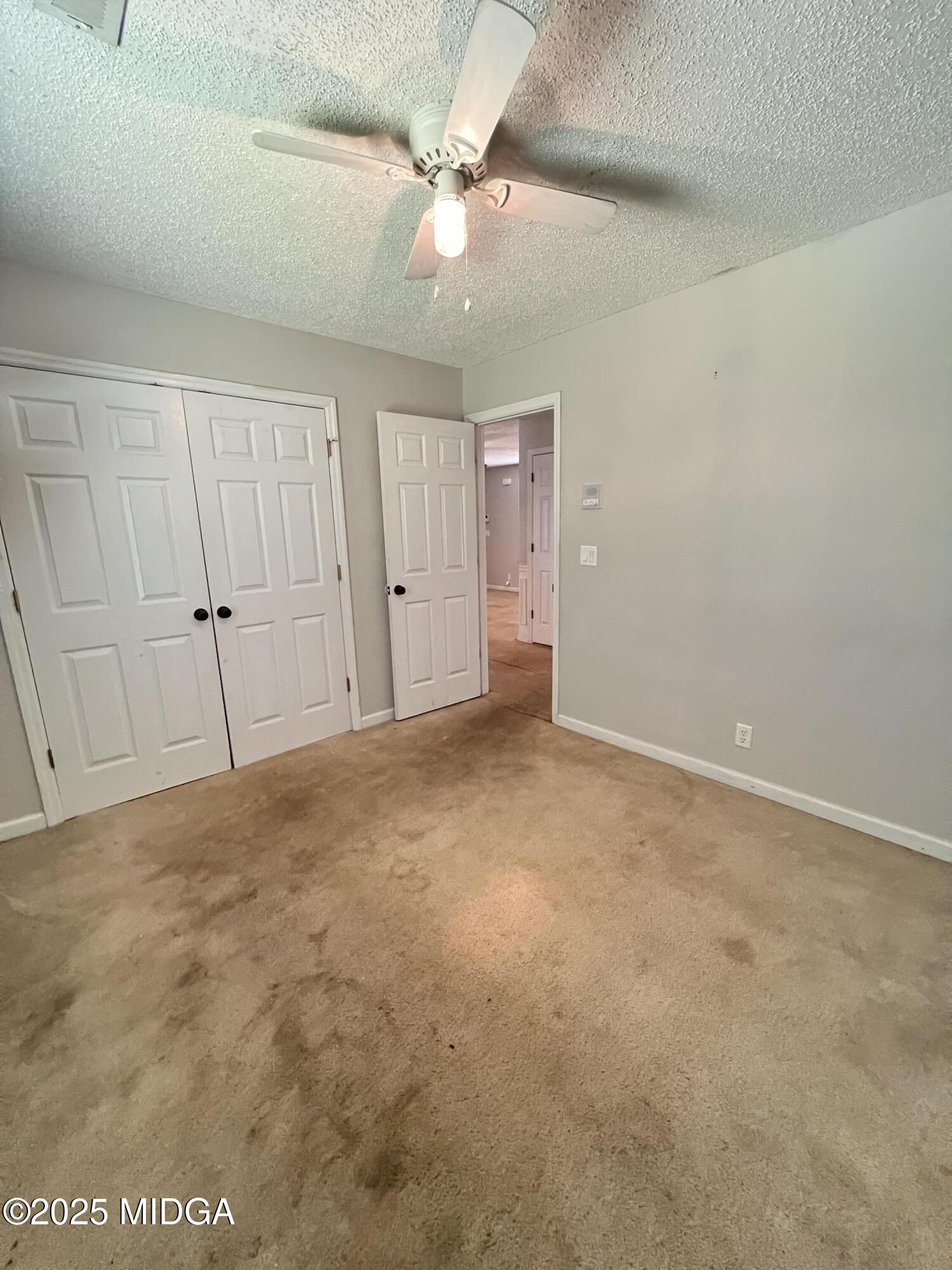 231 Red Berry Road Jackson, GA 30233 - Photo 15 of 23 a view of an empty room
