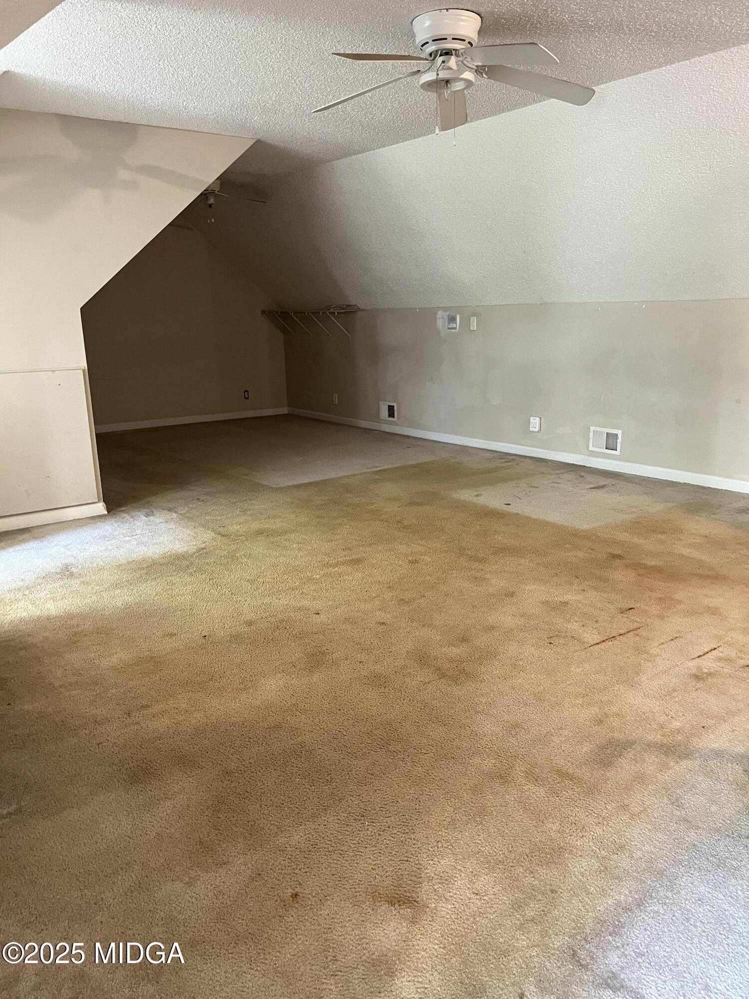 231 Red Berry Road Jackson, GA 30233 - Photo 21 of 23 a view of an empty room