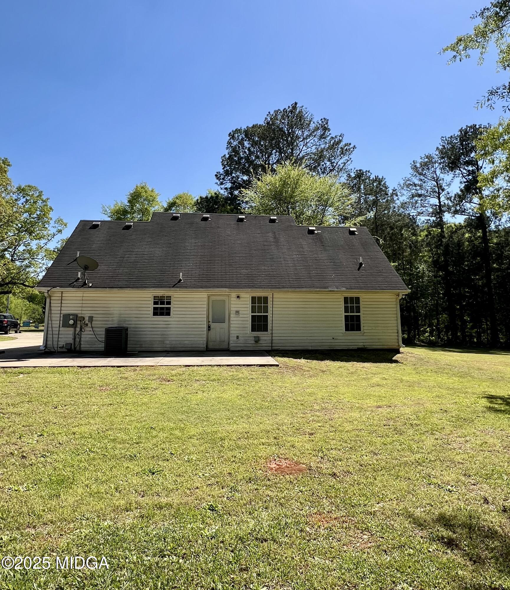 231 Red Berry Road Jackson, GA 30233 - Photo 4 of 23 a house with outdoor space