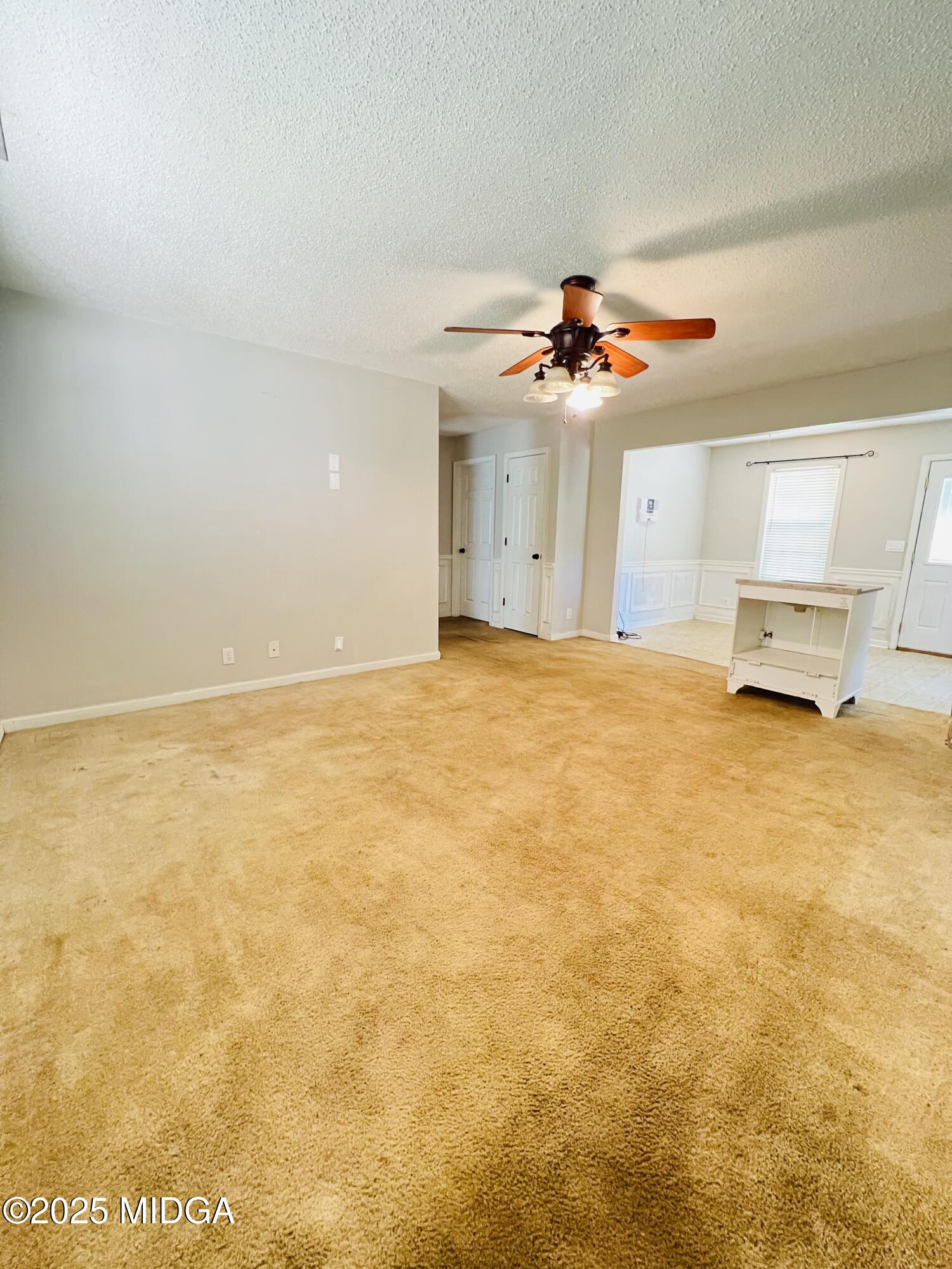 231 Red Berry Road Jackson, GA 30233 - Photo 6 of 23 a view of a room with a ceiling fan