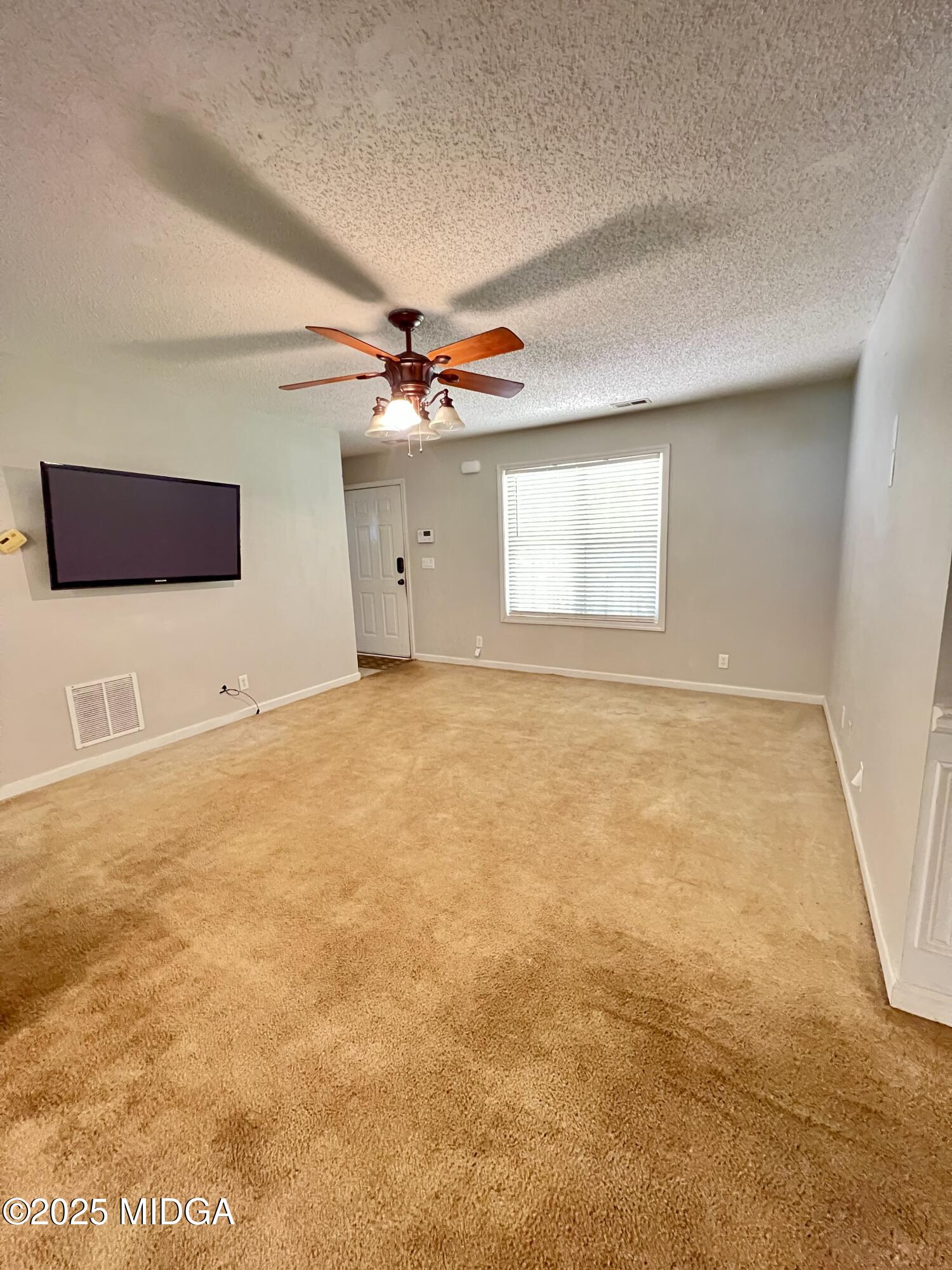 231 Red Berry Road Jackson, GA 30233 - Photo 7 of 23 a view of an empty room