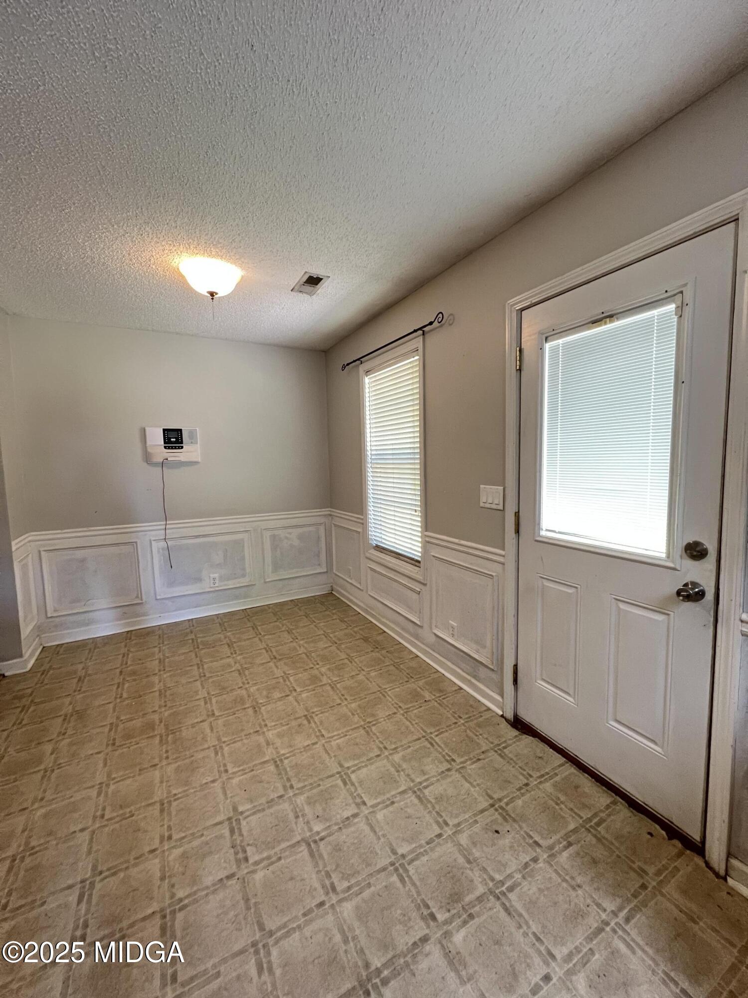 231 Red Berry Road Jackson, GA 30233 - Photo 9 of 23 a view of an empty room