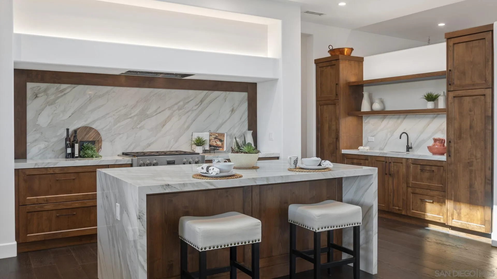 16674 Liberty Ridge San Diego, CA 92127 - Photo 12 of 35 a dining table with chairs and wooden floor