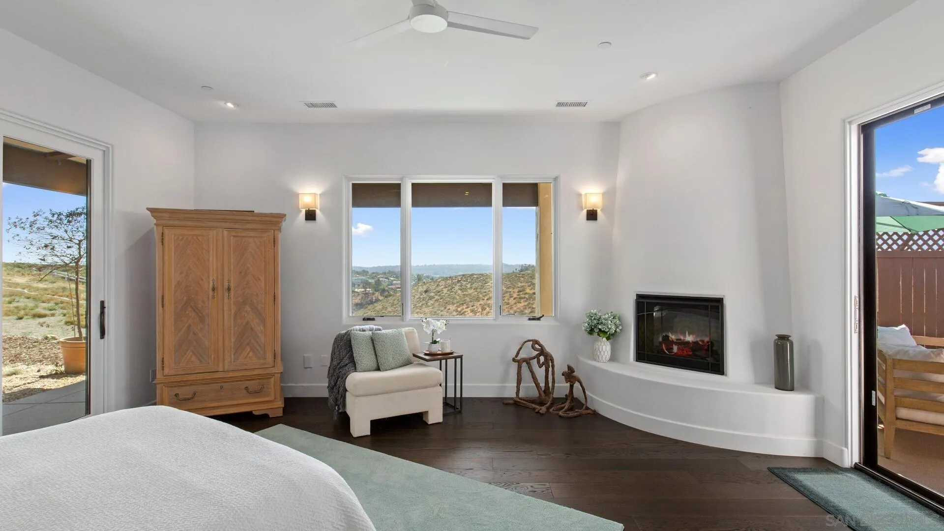 16674 Liberty Ridge San Diego, CA 92127 - Photo 17 of 35 a spacious bedroom with a bed and a couch