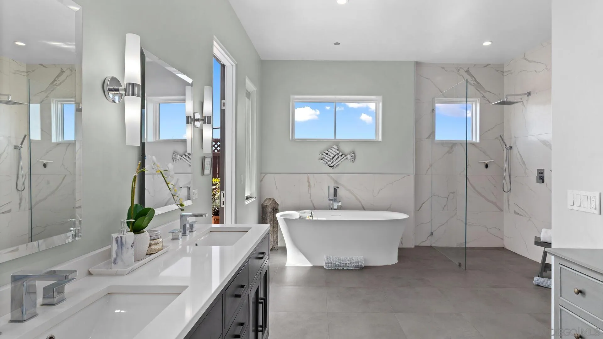 16674 Liberty Ridge San Diego, CA 92127 - Photo 18 of 35 a spacious bathroom with a double vanity sink mirror and shower