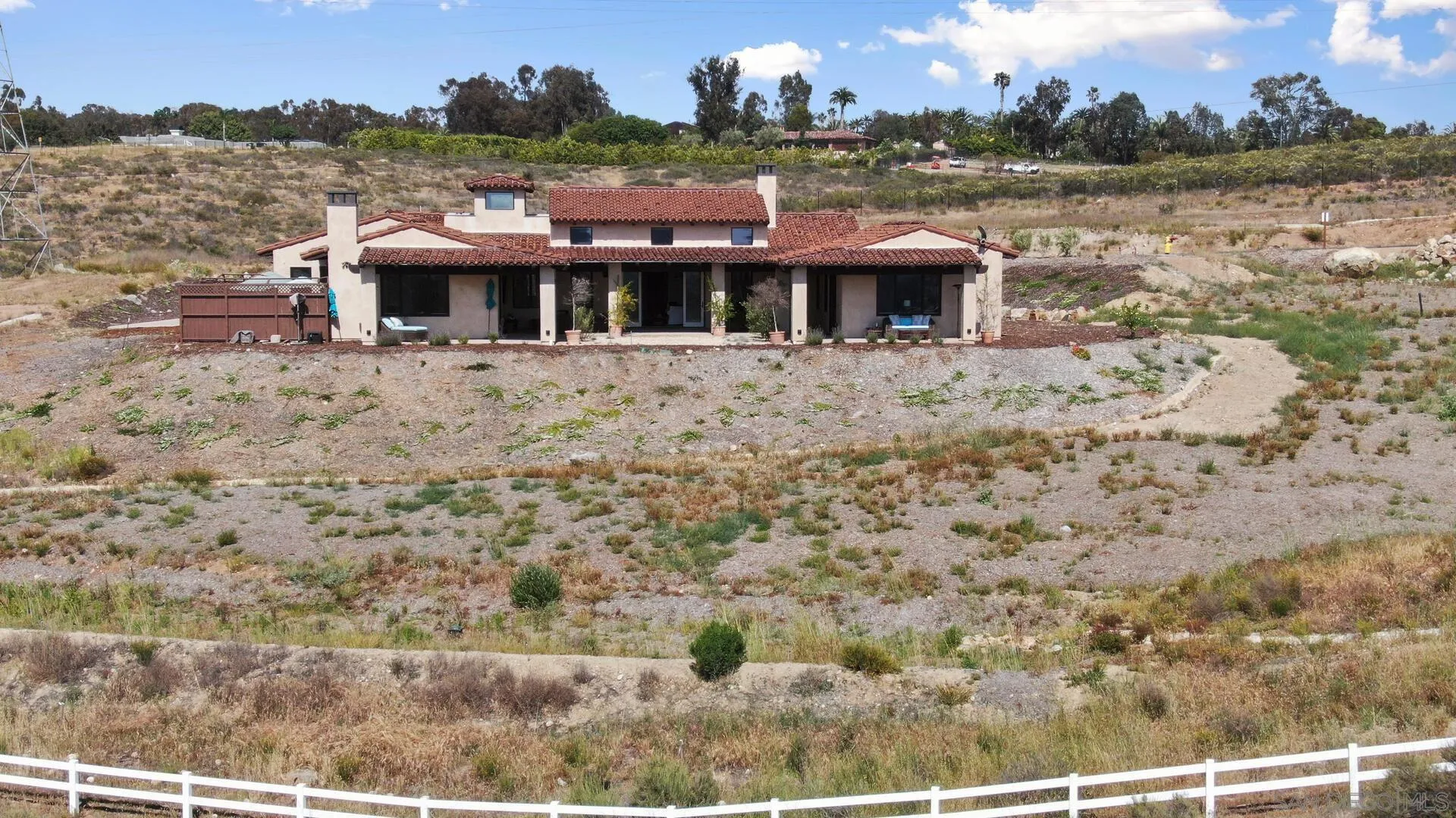 16674 Liberty Ridge San Diego, CA 92127 - Photo 2 of 35 a front view of a house with a yard