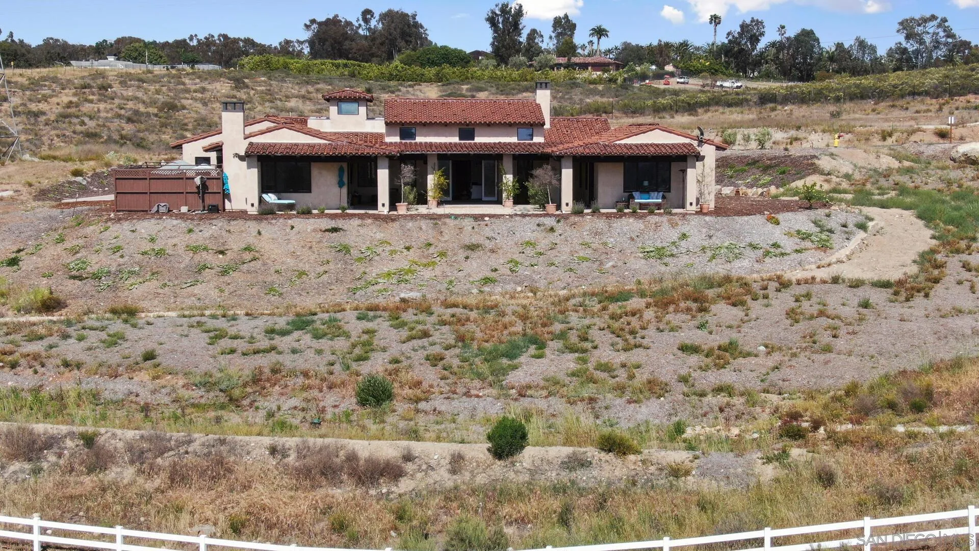 16674 Liberty Ridge San Diego, CA 92127 - Photo 34 of 35 a view of house with a yard