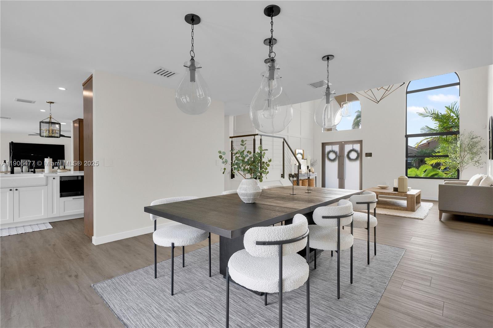 19913 Southwest 3rd Place Pembroke Pines, FL 33029 - Photo 18 of 56 a view of a dining room with furniture window and wooden floor