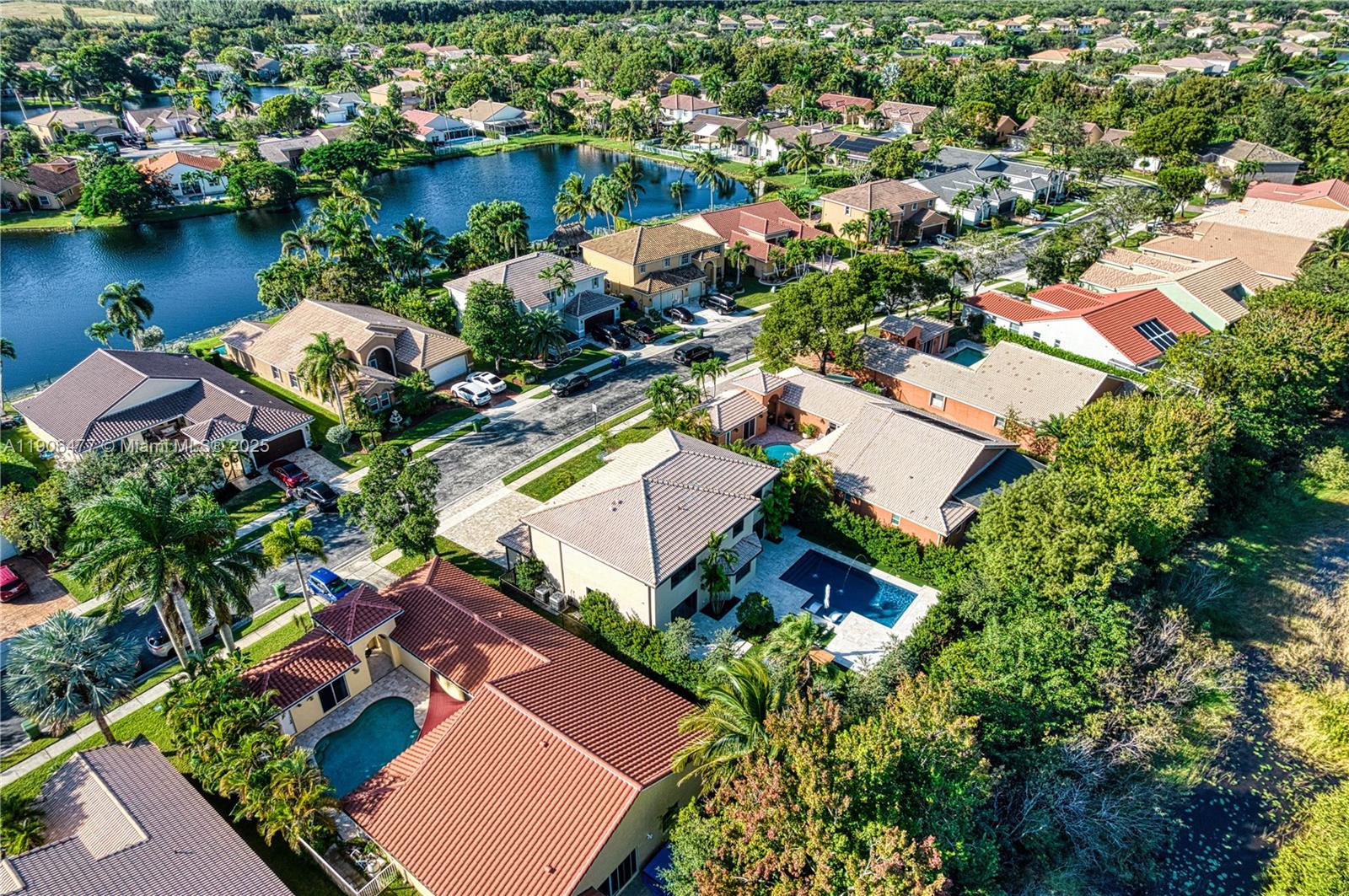 19913 Southwest 3rd Place Pembroke Pines, FL 33029 - Photo 4 of 56 an aerial view of residential houses with outdoor space and lake view