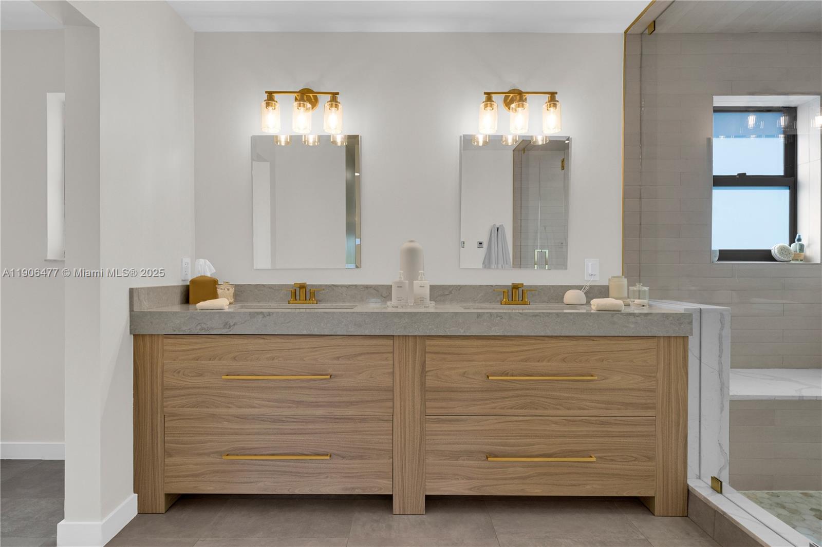 19913 Southwest 3rd Place Pembroke Pines, FL 33029 - Photo 41 of 56 a bathroom with a sink and a mirror