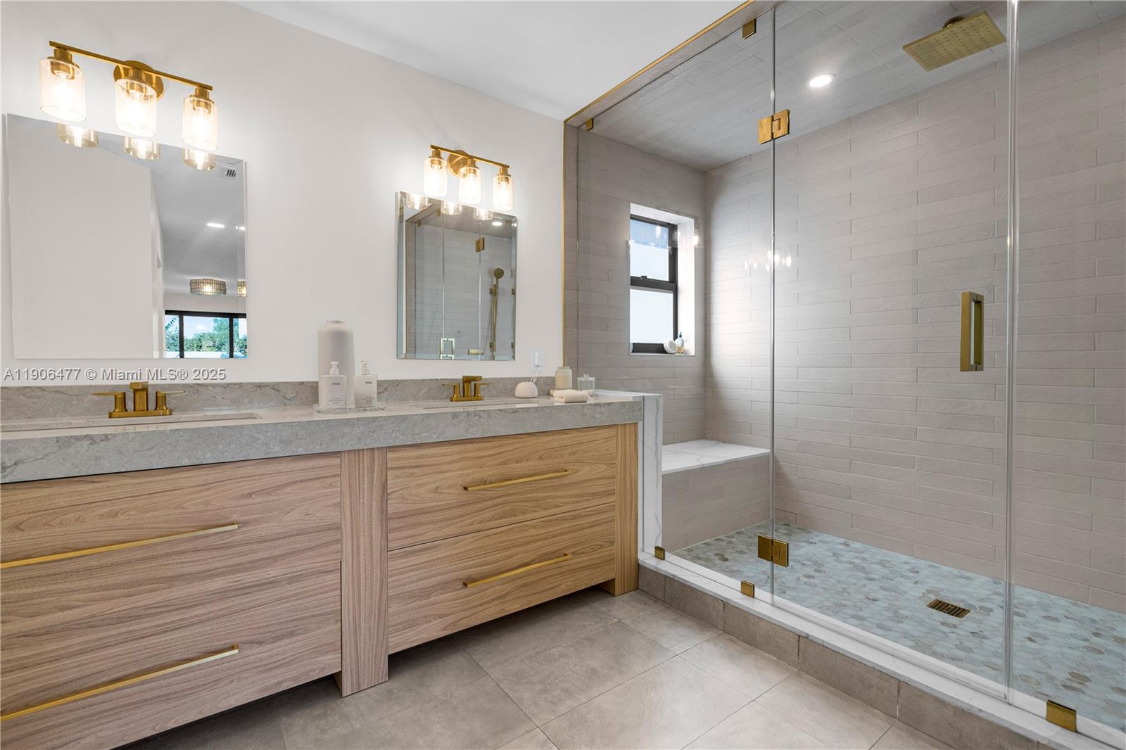 19913 Southwest 3rd Place Pembroke Pines, FL 33029 - Photo 42 of 56 a bathroom with a double vanity sink and a mirror