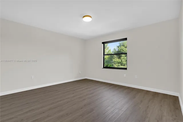 a view of a swimming pool with an outdoor space