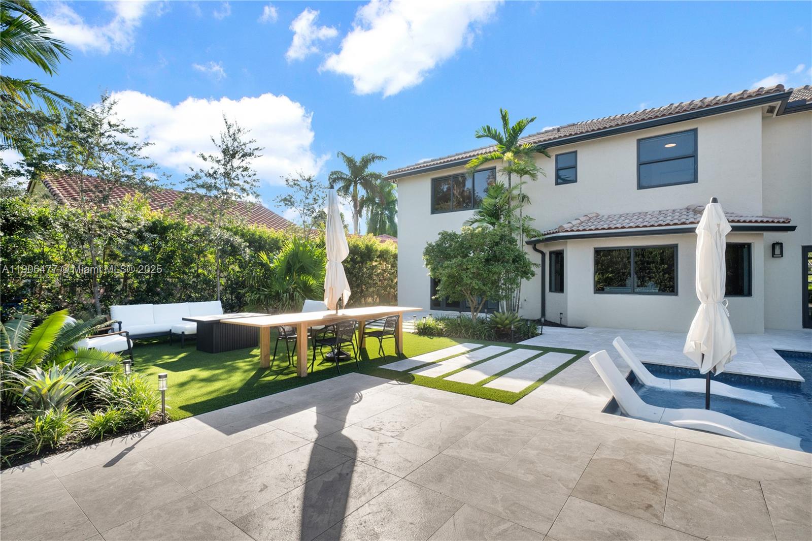 19913 Southwest 3rd Place Pembroke Pines, FL 33029 - Photo 49 of 56 a view of a house with swimming pool and sitting area