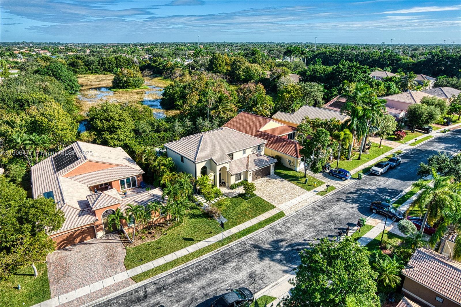19913 Southwest 3rd Place Pembroke Pines, FL 33029 - Photo 8 of 56 an aerial view of a house with a garden