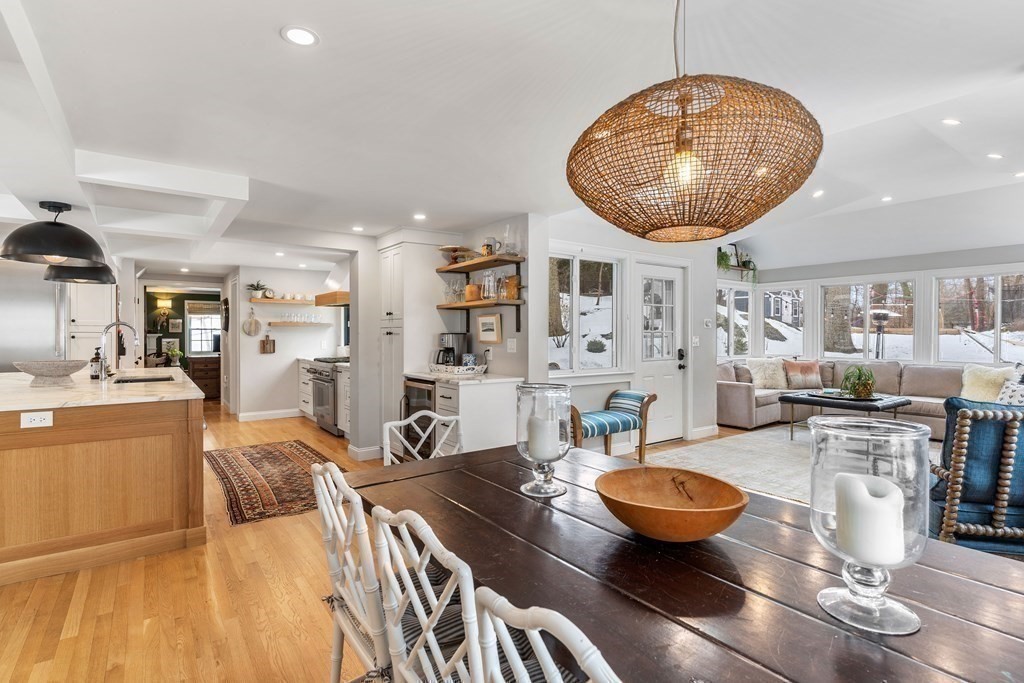 91 Valley Road Milton, MA 02186 - Photo 13 of 29 a living room with lots of table and chairs