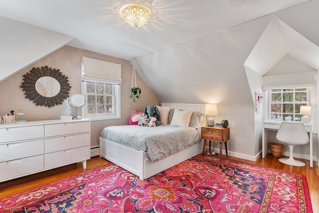 91 Valley Road Milton, MA 02186 - Photo 22 of 29 a bedroom with a bed and window