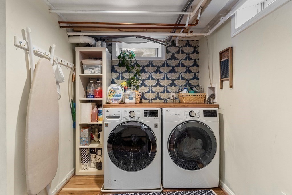 91 Valley Road Milton, MA 02186 - Photo 27 of 29 a utility room with dryer and washer