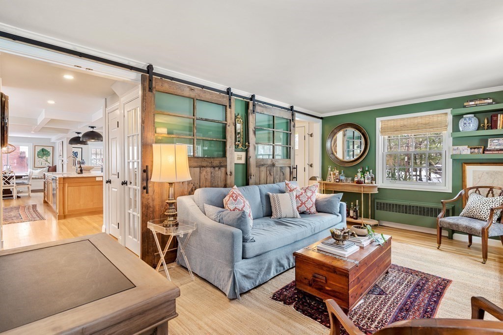 91 Valley Road Milton, MA 02186 - Photo 6 of 29 a living room with furniture and a large window