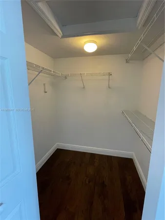 a view of a room with racks on the wall
