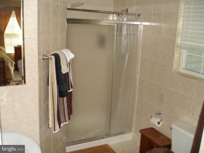 1117 Engleberth Road Essex, MD 21221 - Photo 15 of 20 a bathroom with a shower