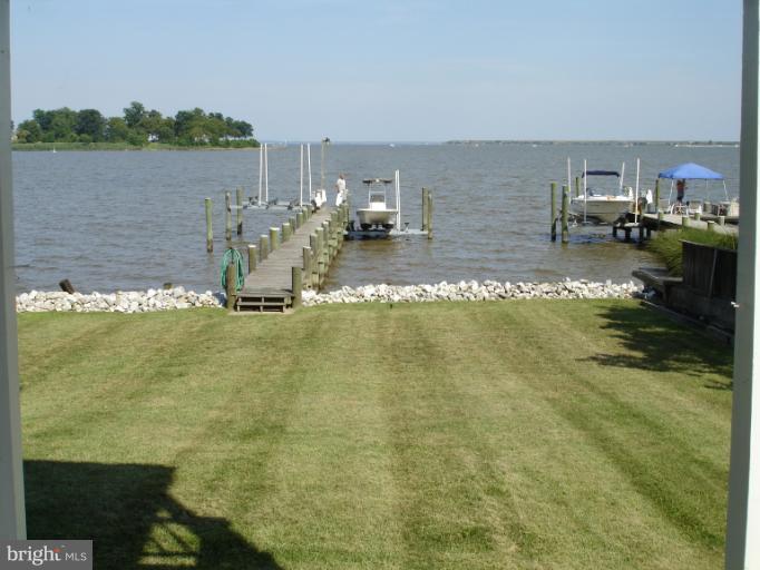 1117 Engleberth Road Essex, MD 21221 - Photo 16 of 20 a view of a lake with houses