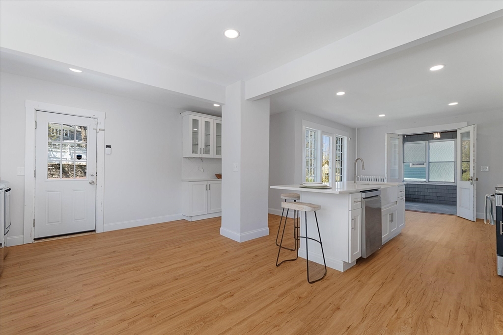 4 Chamberlain Parkway Worcester, MA 01602 - Photo 14 of 42 a kitchen with sink and wooden floor
