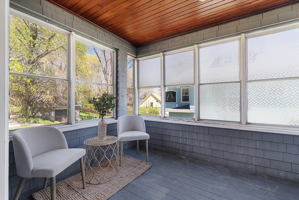 4 Chamberlain Parkway Worcester, MA 01602 - Photo 15 of 42 a dining room with furniture and a floor to ceiling window
