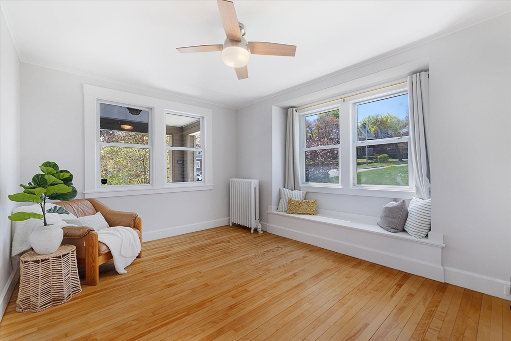 4 Chamberlain Parkway Worcester, MA 01602 - Photo 17 of 42 a living room with wooden floor and a window