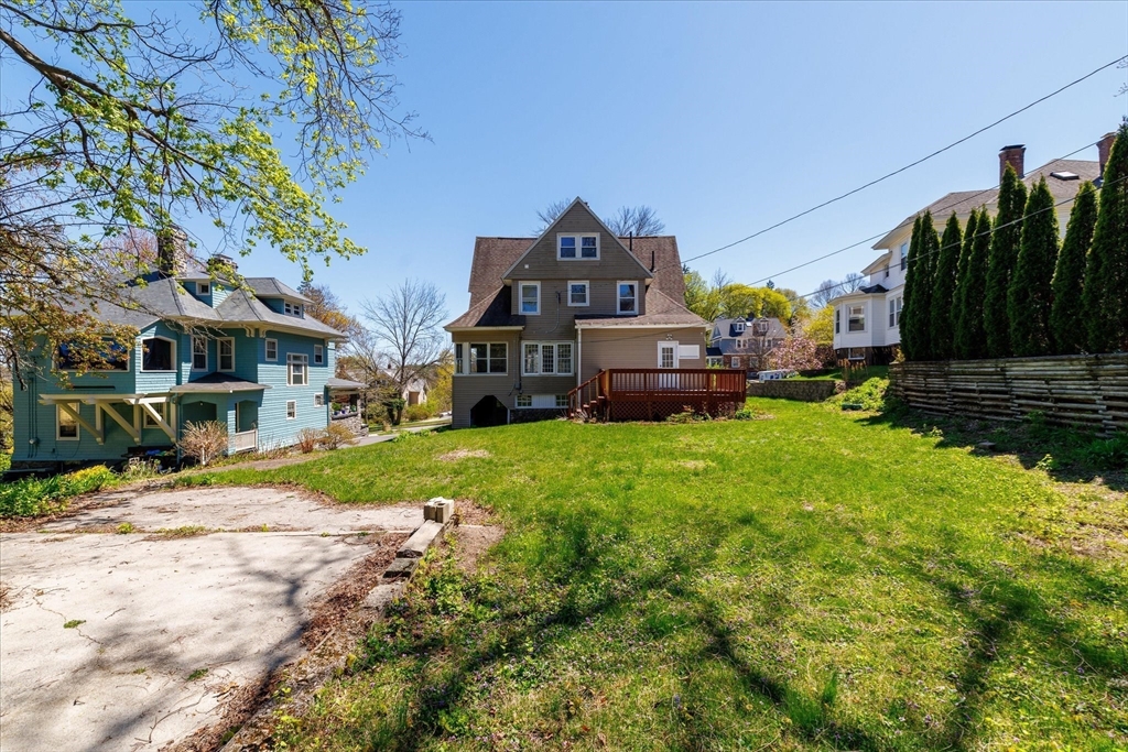 4 Chamberlain Parkway Worcester, MA 01602 - Photo 38 of 42 a front view of a house with a yard