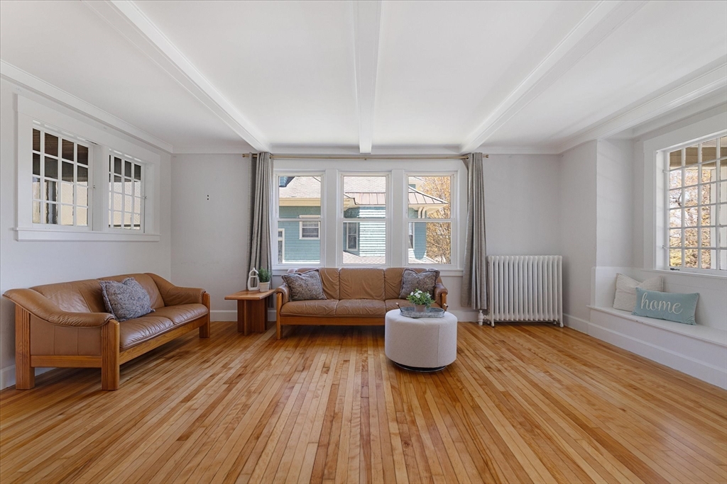 4 Chamberlain Parkway Worcester, MA 01602 - Photo 5 of 42 a living room with furniture and a wooden floor