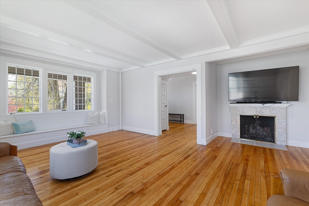 4 Chamberlain Parkway Worcester, MA 01602 - Photo 6 of 42 a living room with furniture and a fireplace